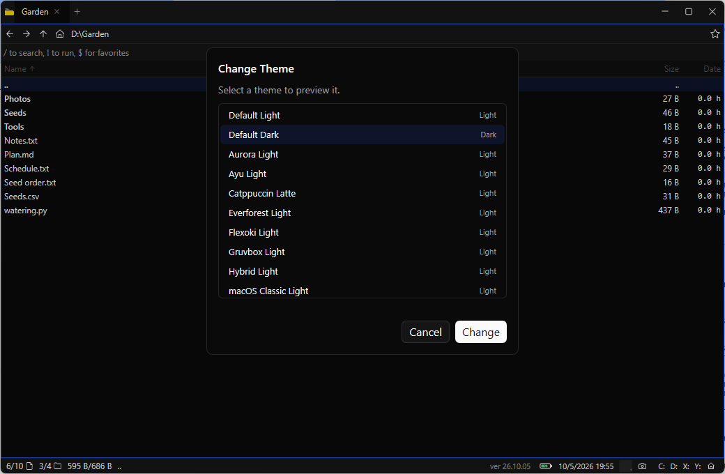 Change Theme dialog with Default Dark selected and previewed in the window behind it